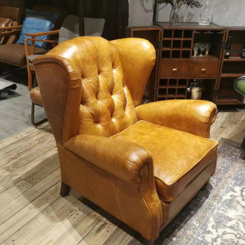 brown leather chesterfield chair