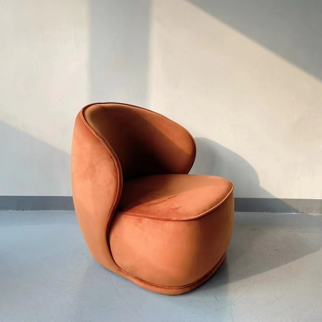 orange velvet armchair