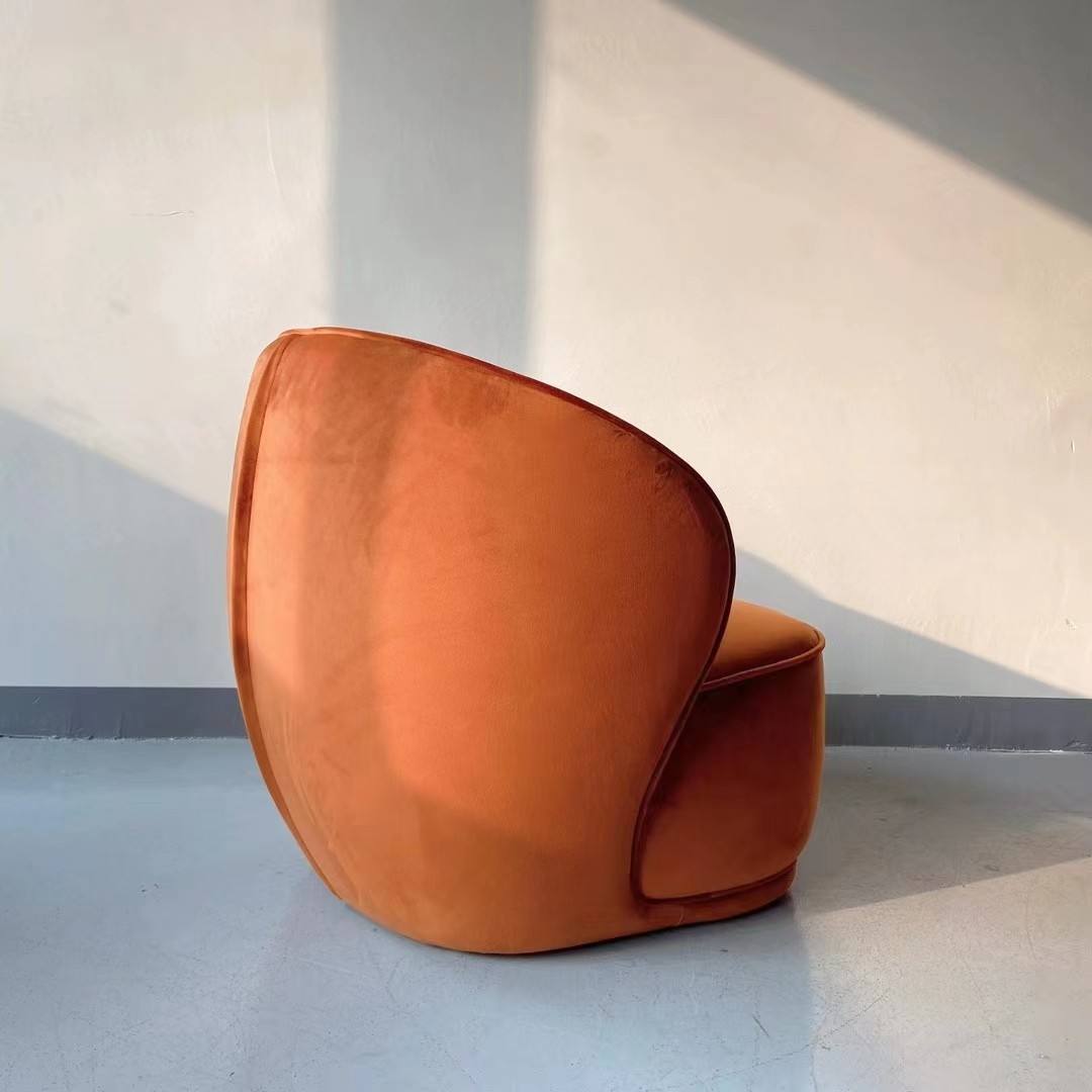 orange velvet armchair