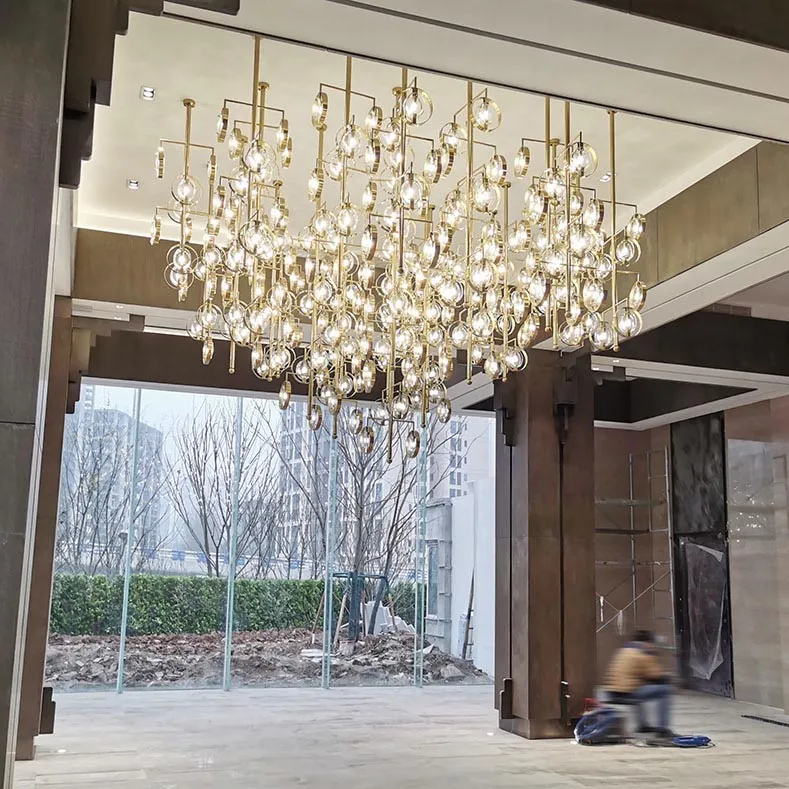 Lampadario in acciaio inossidabile con sfera di cristallo