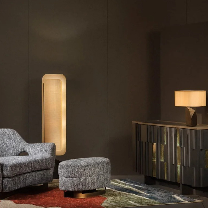 A lamp featuring an artistic shape and a wooden base