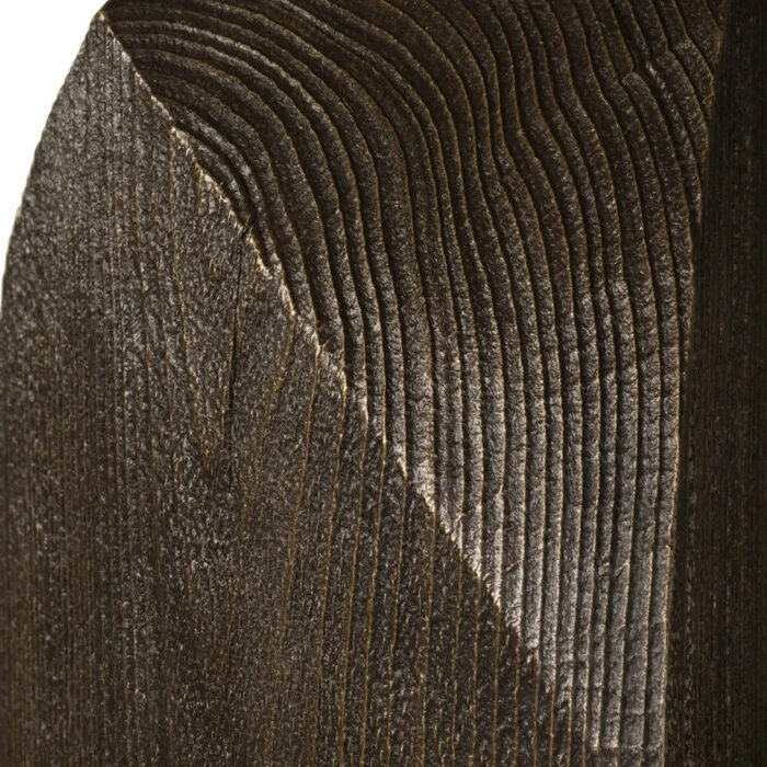 A lamp featuring an artistic shape and a wooden base