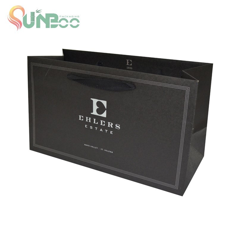 Sac cadeau en papier kraft noir avec poignée