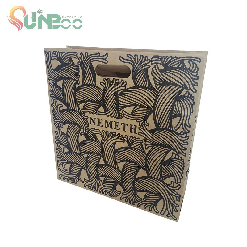 Sac en papier kraft brun avec poignée en ruban