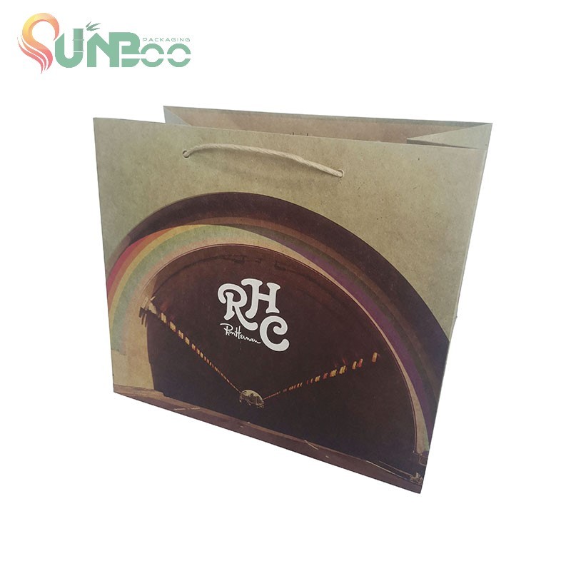 Sacs en papier de magasinage de cadeau d'artisanat brun avec poignée