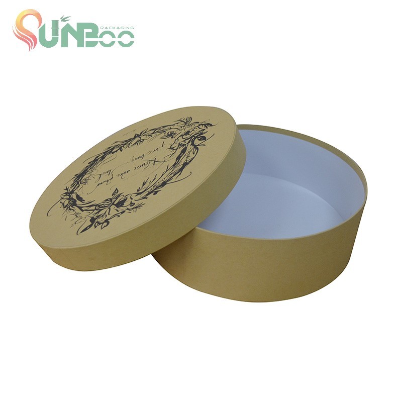 Boîte-cadeau ronde en papier kraft brun avec impression noire