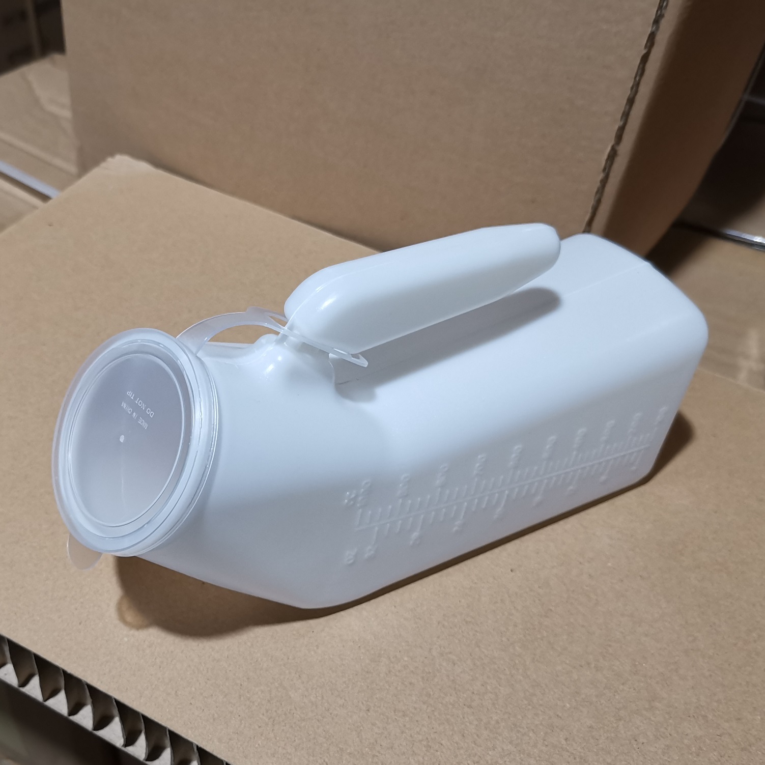 Kiömlésbiztos hordozható férfi piszoárpalack