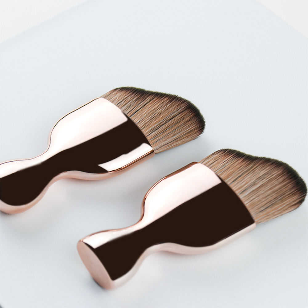 Rose gold face tanning brushes with curved head bristles for face tanning