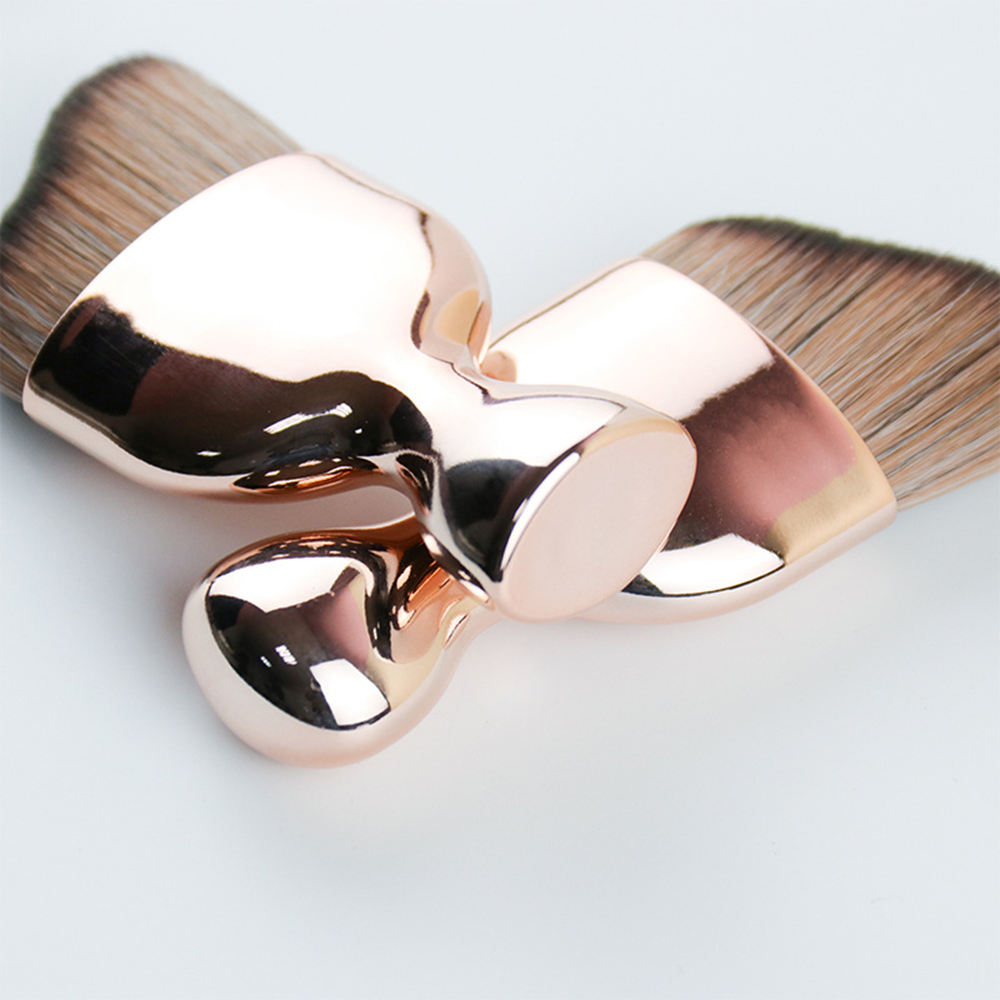 Rose gold face tanning brushes with curved head bristles for face tanning