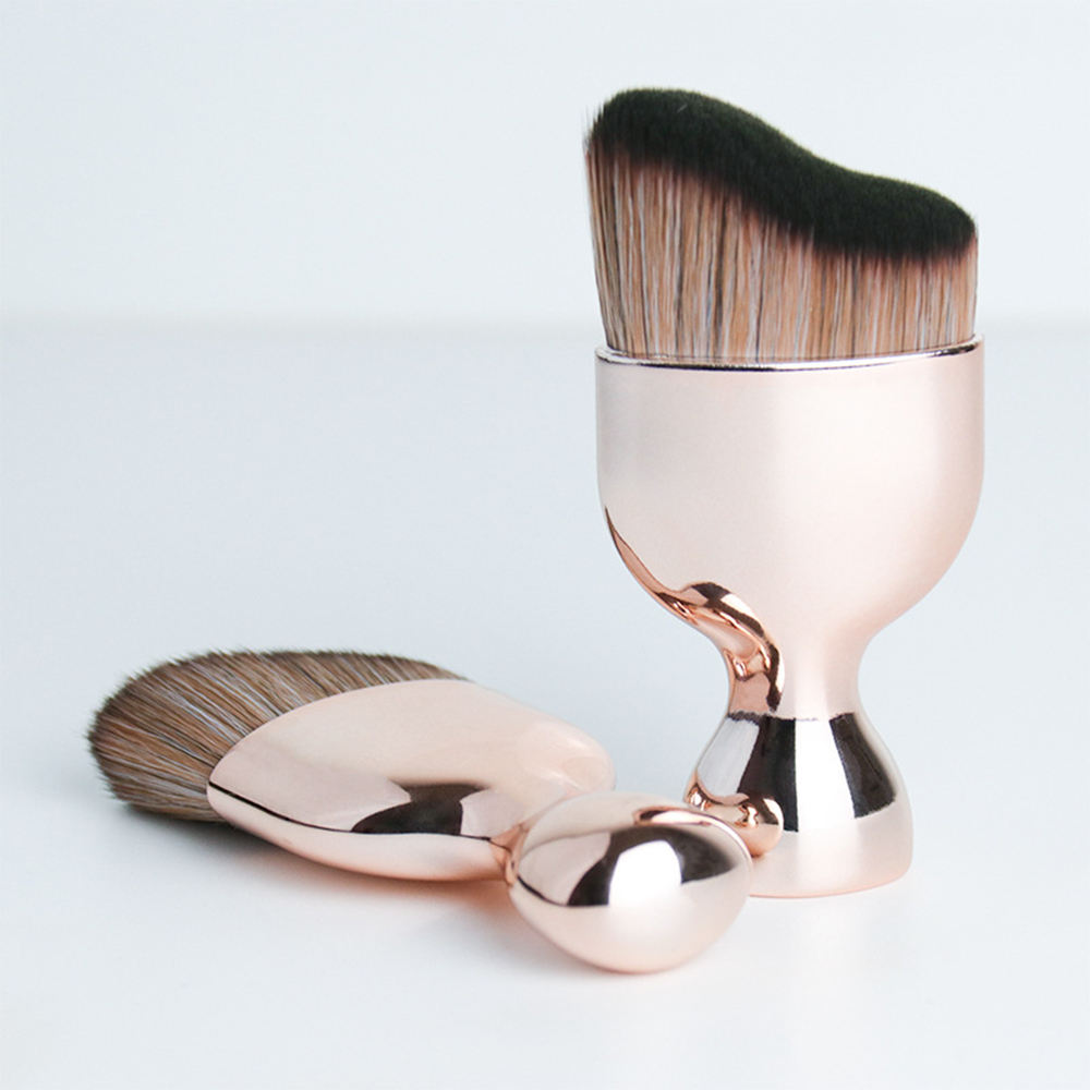 Rose gold face tanning brushes with curved head bristles for face tanning