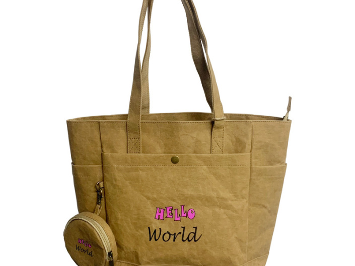 Veelzijdigheid van bruine kraft-boodschappentas met rits en klein rond vak