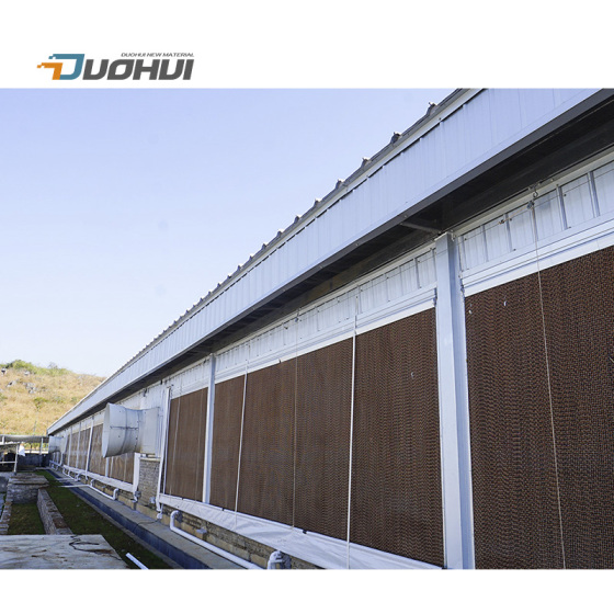 Cooling pad wall installation for poultry farm cooling system