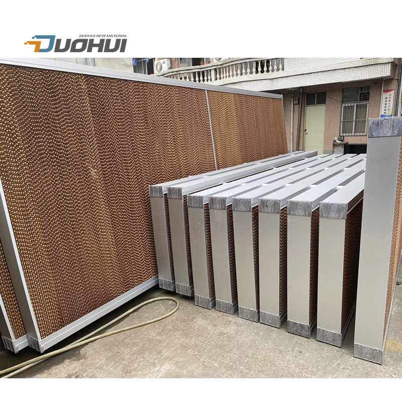 Evaporative cooling pad for poultry farm cooling system