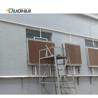 Evaporative cooling pad for poultry farm cooling system