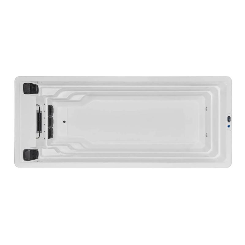 What are the health hazards of adding too much chlorine to a swim spa tub?