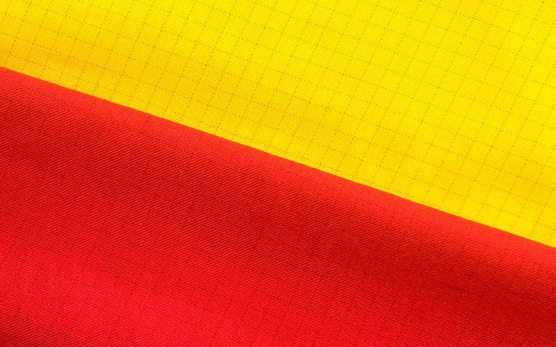 Stretch flame retardant and anti-static plaid fabric