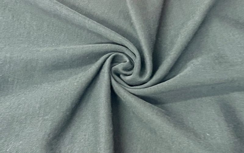 Flame retardant knitted stretch fabric