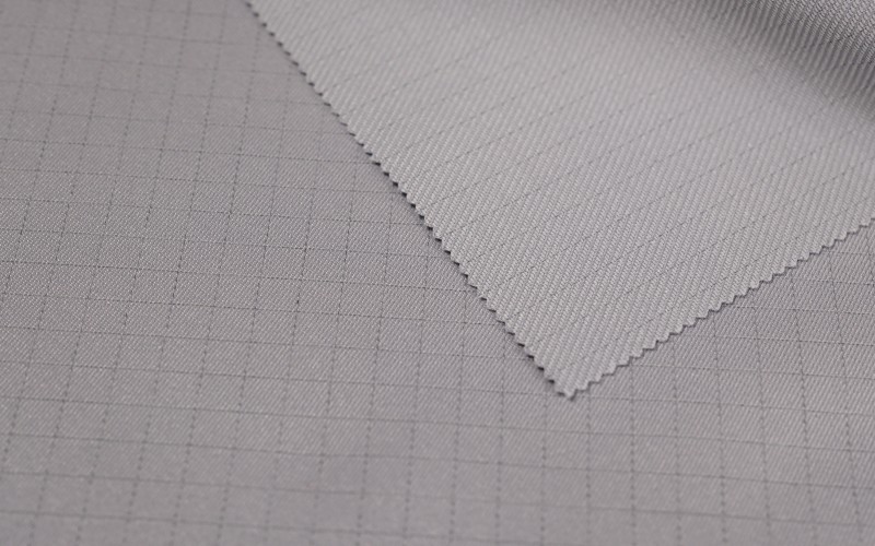 Antistatická tkanina s elastickou mřížkou 0,7