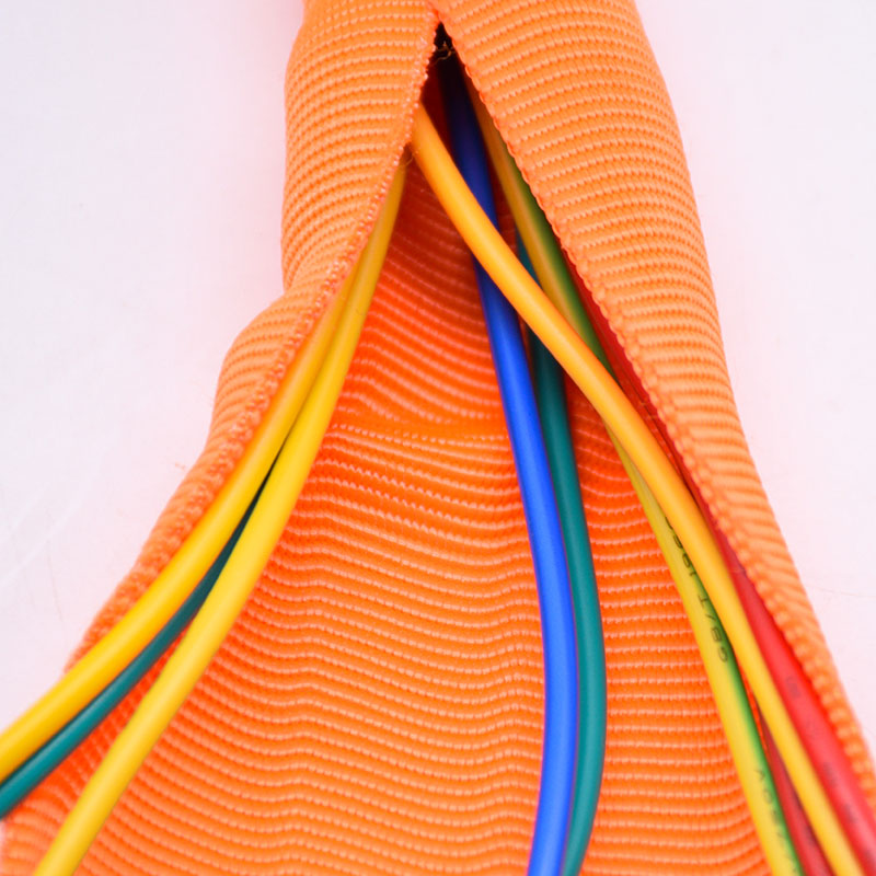Manchon de câble textile à fermeture automatique à double couche