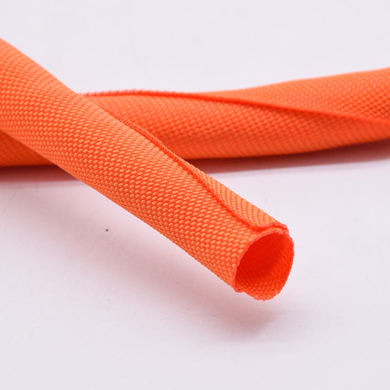 Avvolgimento con telaio in filo intrecciato diviso in tessuto automobilistico arancione