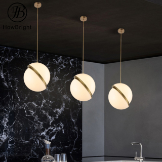 Wyjątkowa designerska lampa wisząca w kolorze różowego złota do przedpokoju