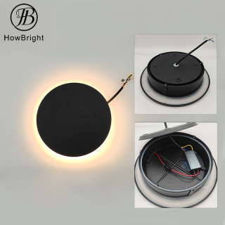 Luminária de parede redonda LED à prova d'água para exterior, ideal para casas de campo.