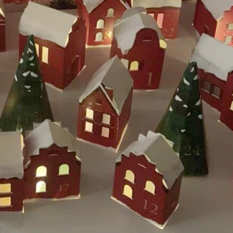 house village advent calendar set to Christmas 24 days.