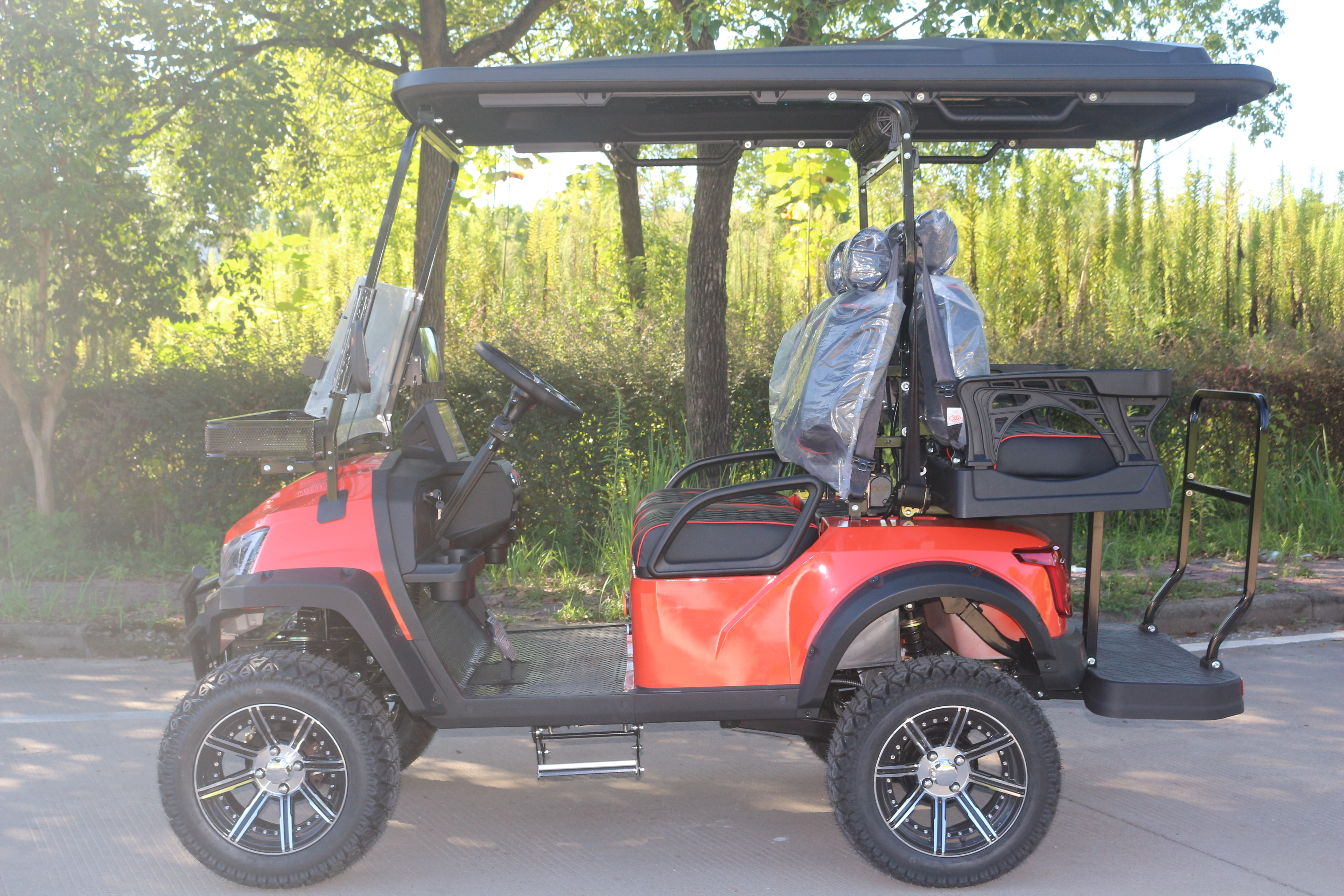 Heavy-Duty Red Electric Golf Vehicle with Rugged Tires, Perfect for Golf and Off-Road Exploration