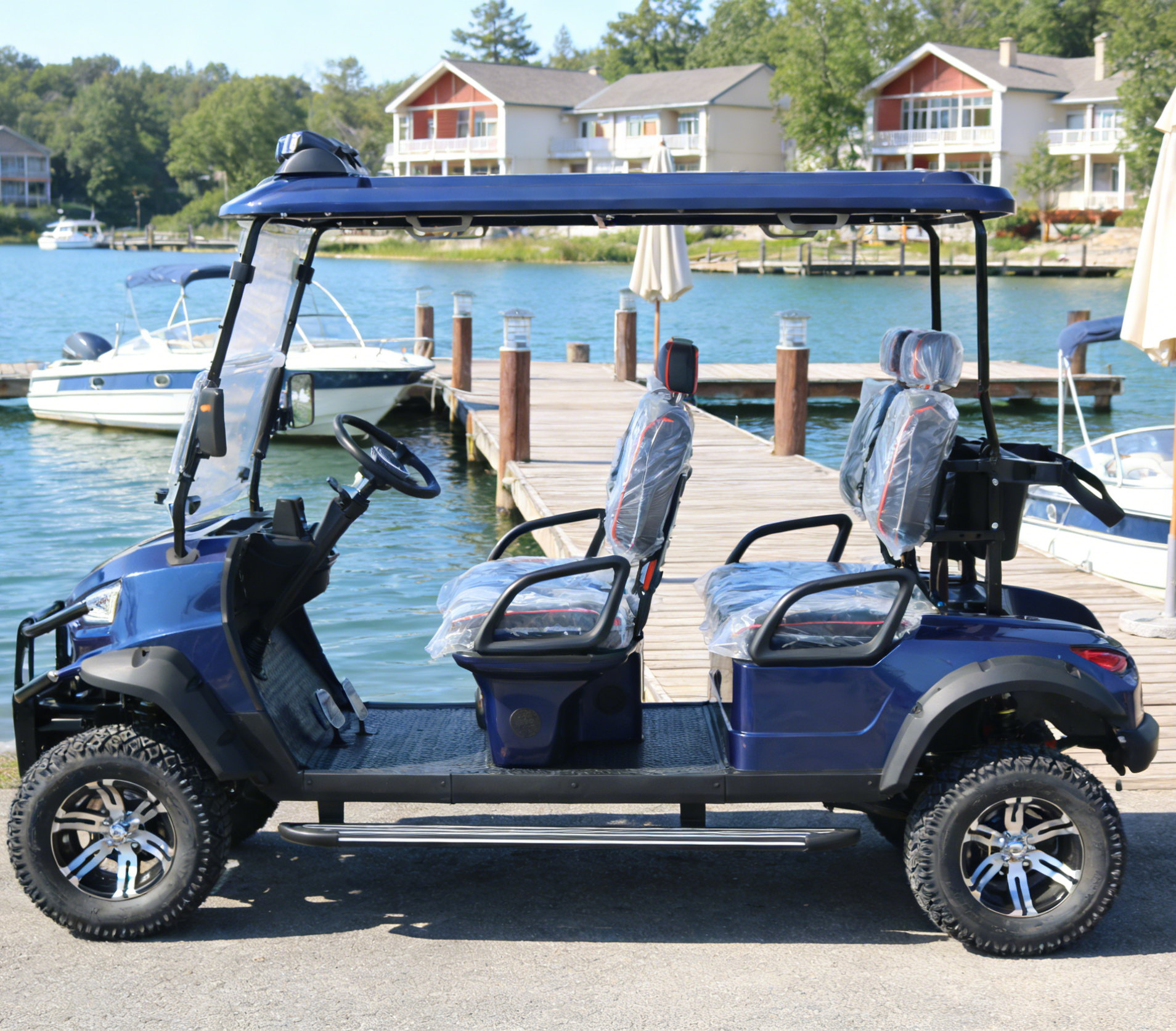 Navy Blue 4-Seat Golf Cart: Rugged Tires for Lakefront Venue Use