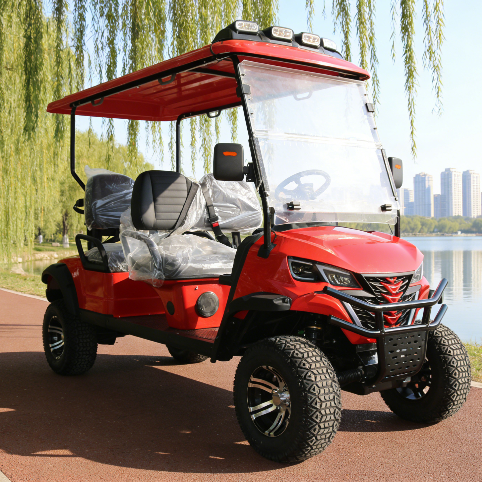 Red 4-Seat Golf Cart with Off-Road Tires for Resort Shuttles