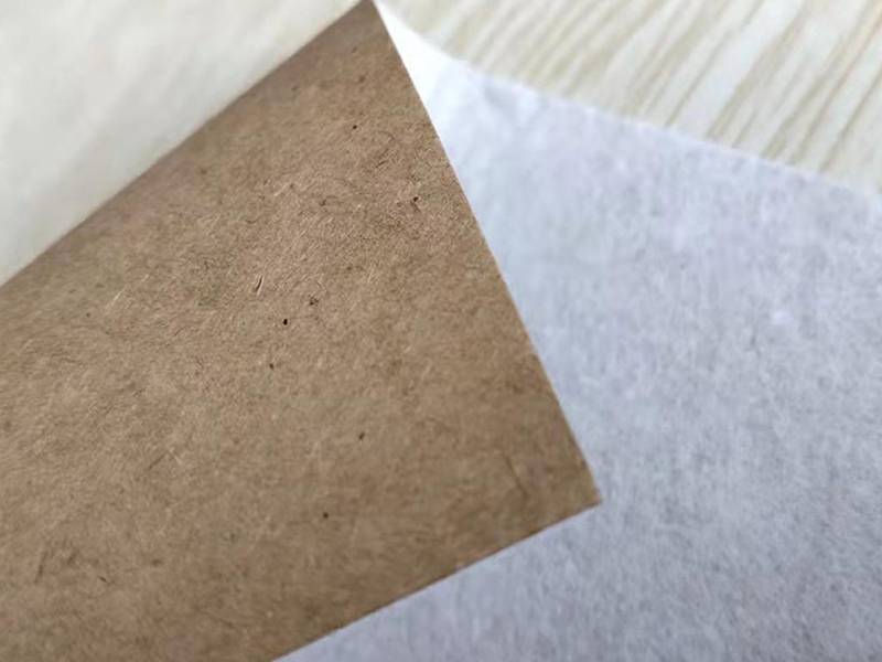 Composite absorbent paper