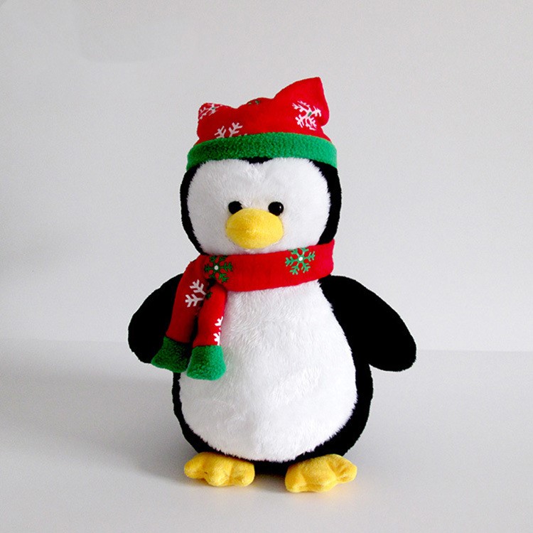 Christmas plush penguin toy with hat and scarf
