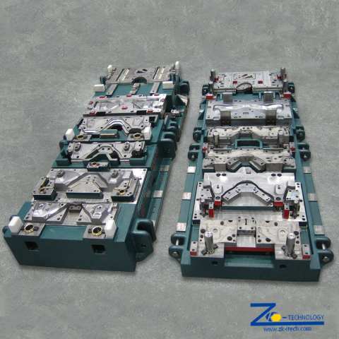 Többállomásos progresszív présszerszám