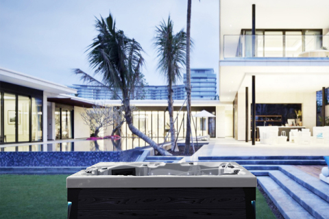 How can you make your outdoor hot tub more insulated?