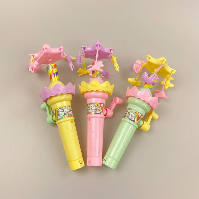 High Quality Hand Operated Merry-go-round Candy Toy With Hand Shake Lamp Light Plastic Carousel Toy Candy