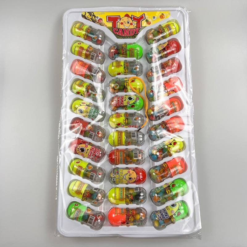 Cartoon burning bomb character capsule shaped sweet fruits flavor hard candy pressed candy