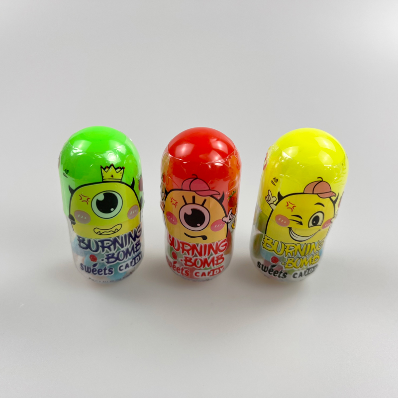 Cartoon burning bomb character capsule shaped sweet fruits flavor hard candy pressed candy