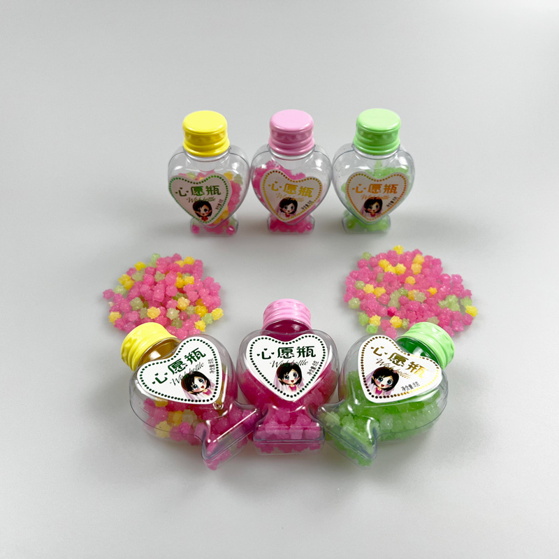 Wish bottle packed with little star shaped multicolored sweet hard candy