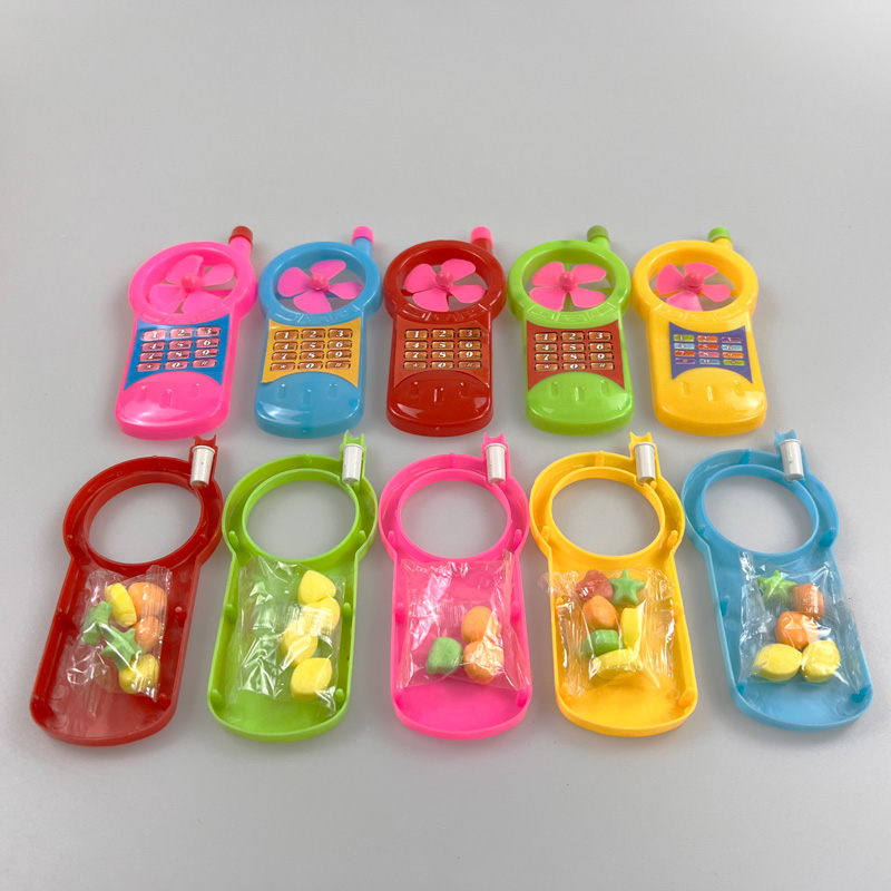 Kids plastic toy mobile phone with fan with fruity tablet candy pressed candy