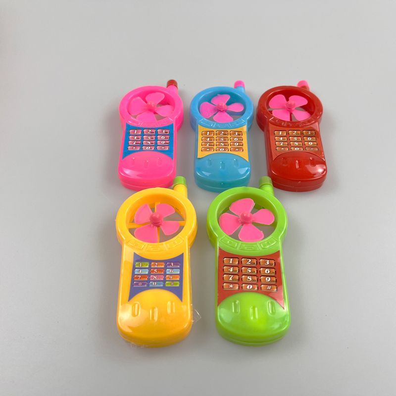 Kids plastic toy mobile phone with fan with fruity tablet candy pressed candy