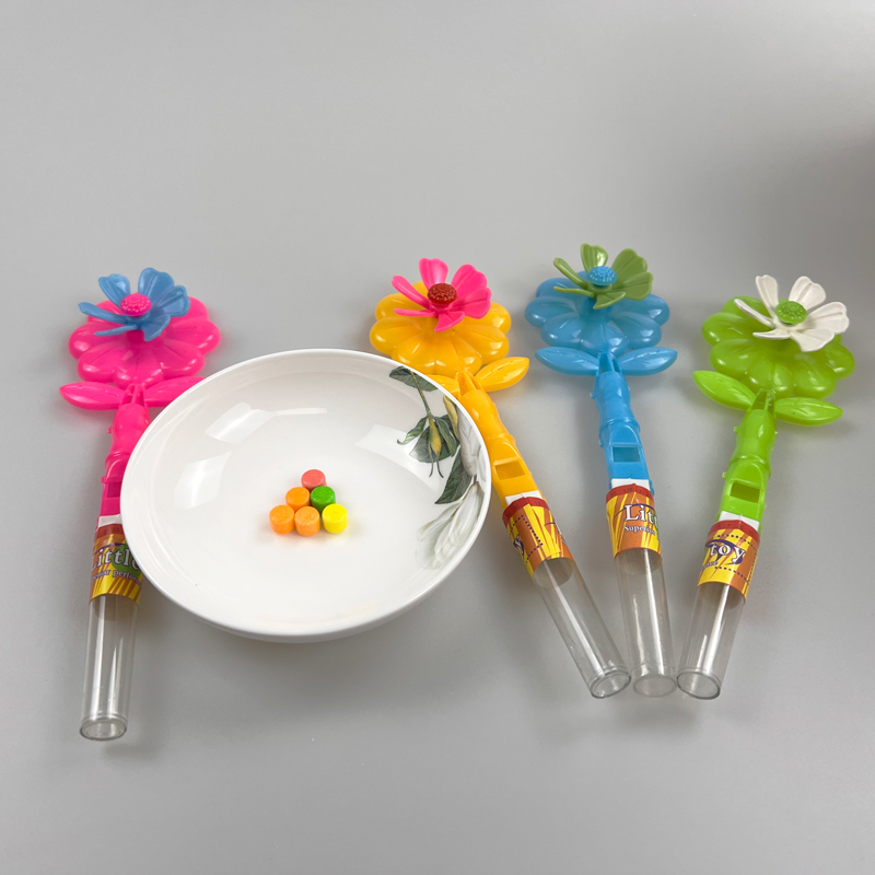 Flower shaped toy fan and whistle with colorful sweet tablet candy toy candy