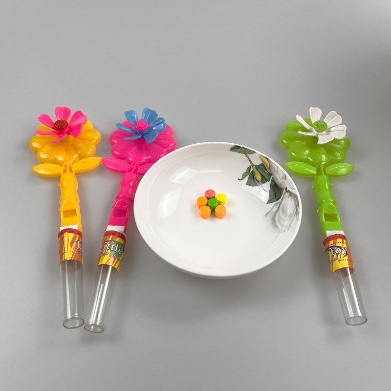 Flower shaped toy fan and whistle with colorful sweet tablet candy toy candy