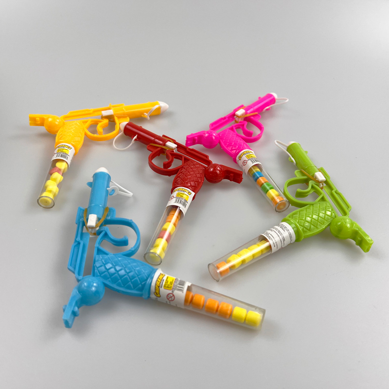 Kids favorite toy catapult pistol with tasty fruity tablet candy toy candy