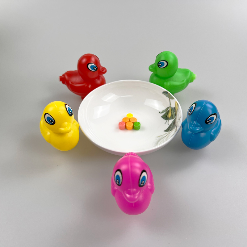 Funny shape plastic toy duck with tasty fruity pressed candy toy candy