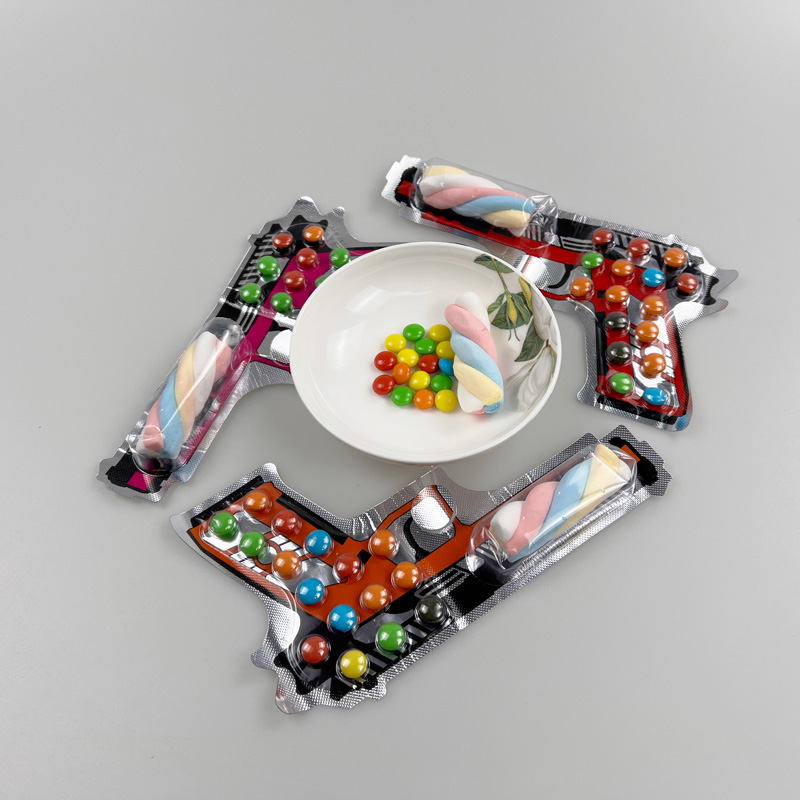 Hot sale gun shape wrapper with colorful chocolate beans and sweet marshmallow soft candy