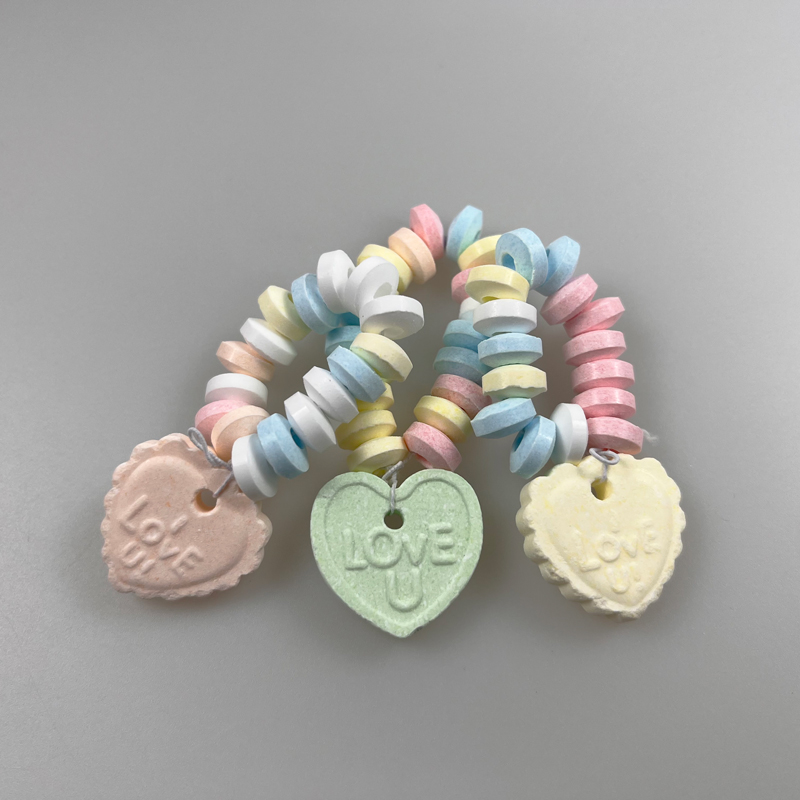 Good looking heart-shaped pendant bracelet fruits flavor tablet candy pressed candy