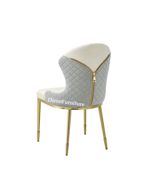 Silla de comedor moderna tapizada y latón dorado.