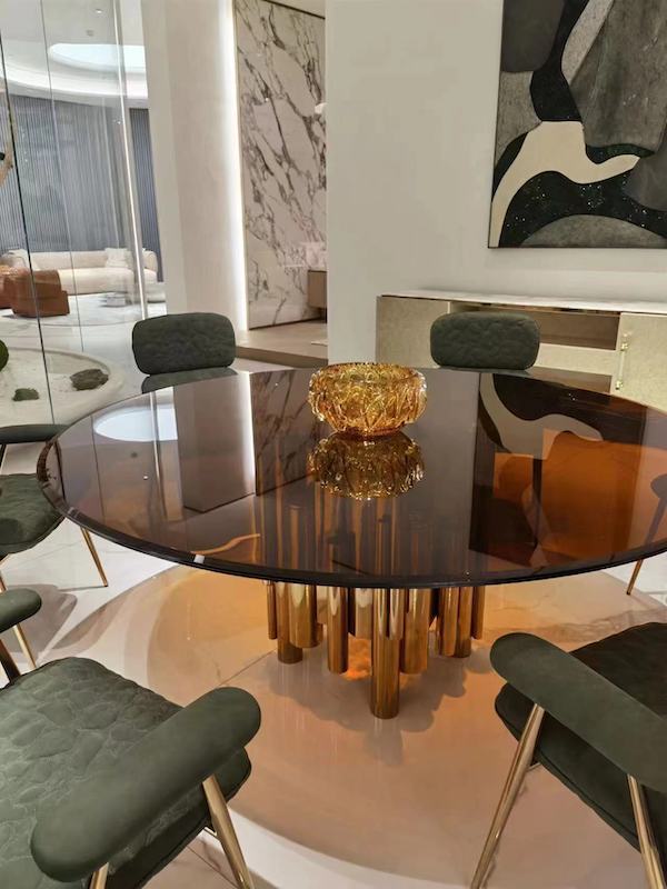 glass and stainless steel dining table