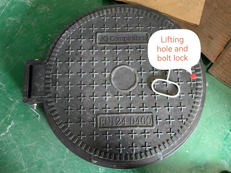 Hinged manhole cover