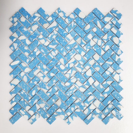 Mosaico in marmo, travertino e terrazzo con coltello ad acqua